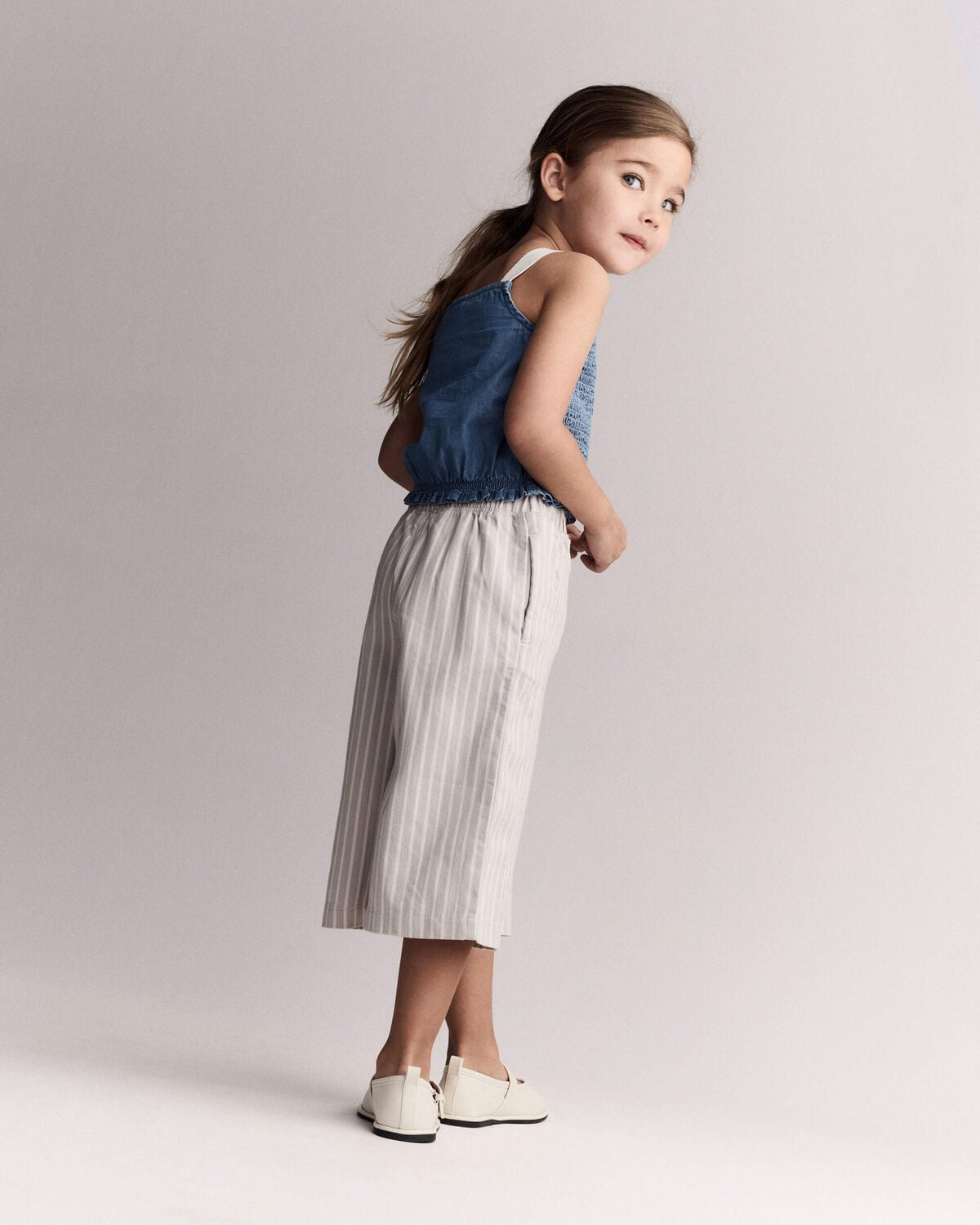 Toddler Girl Smocked Peplum Top in Chambray - Image 6