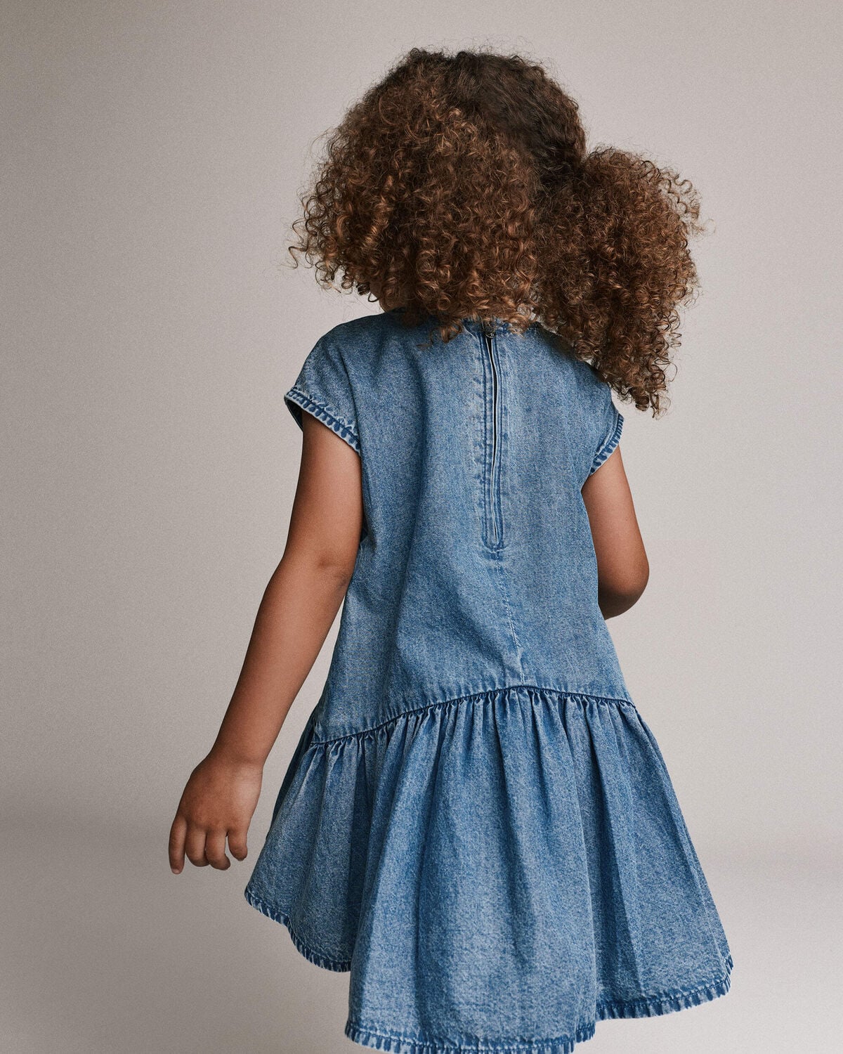 Toddler Girl Asymmetrical Drop-Waist Dress in Denim - Image 4