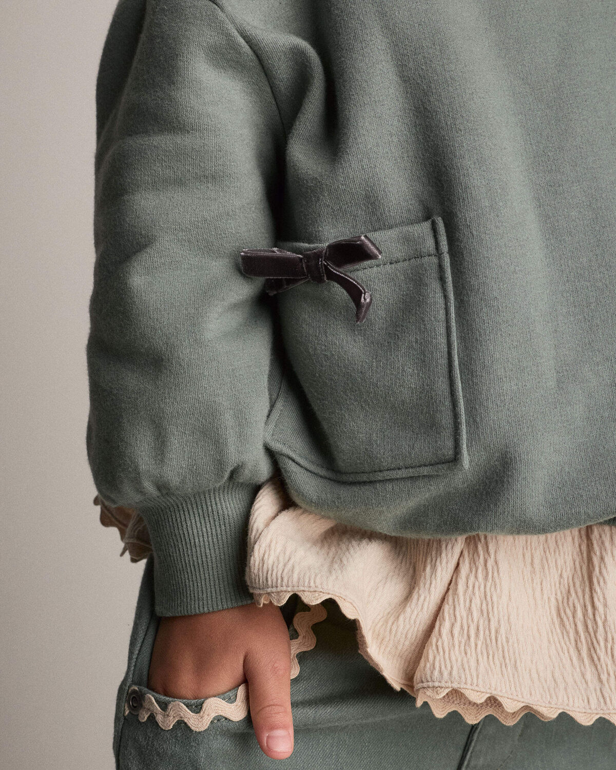 Toddler Girl Otter Sweatshirt™ with Bow Pockets - Olive - Image 3