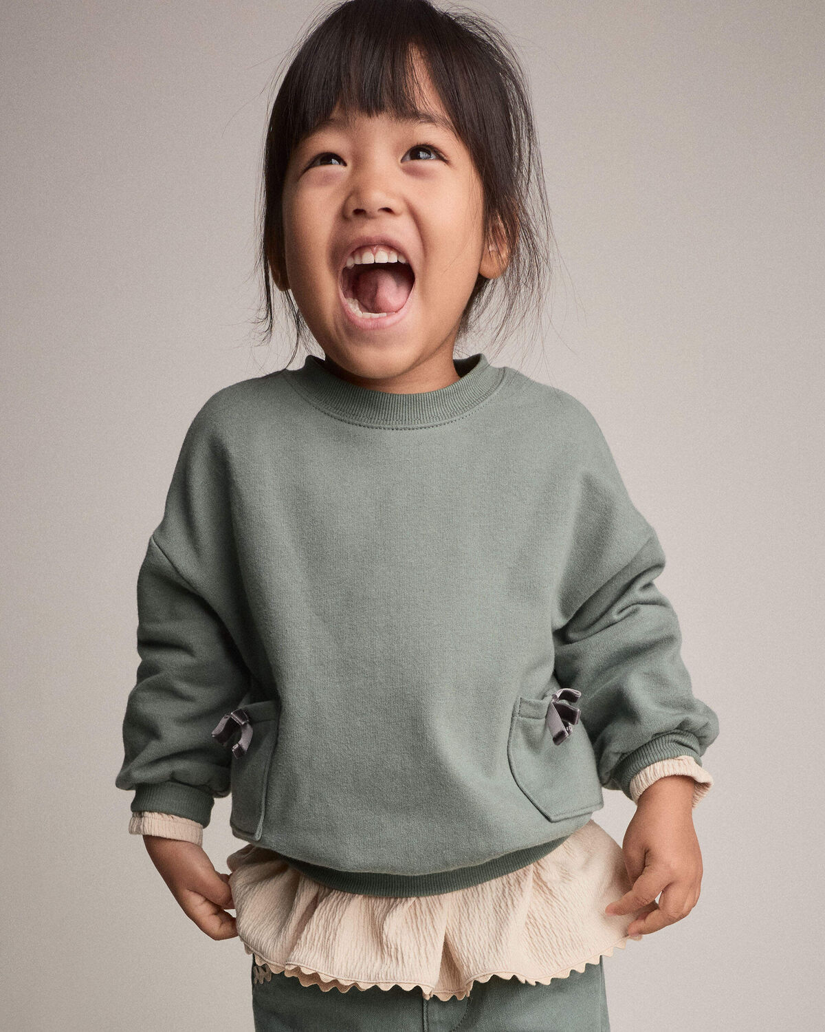Toddler Girl Otter Sweatshirt™ with Bow Pockets - Olive - Image 4